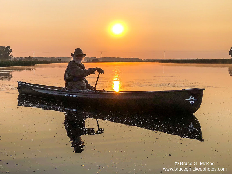 Photo of Paddling friend Jim Connors at sunrise